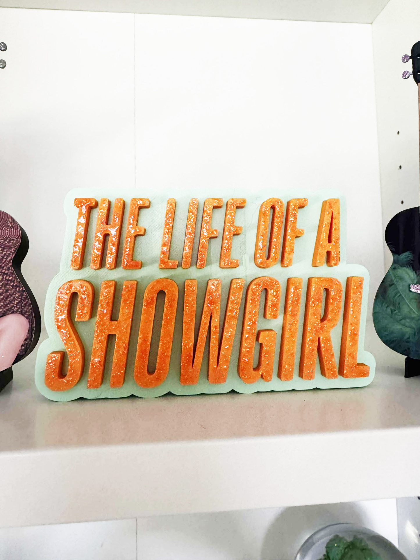 TS12 - The Life of a Showgirl sign